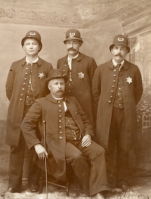 http://www.morrisoncountyhistory.org/museumpics/1890police75.jpg Little Falls Police Force of 1890. Chief Thomas Bailey, Jake Mrozik, William Tourtillot, and John Roy. Little Falls, Minnesota, went from being a village to becoming a city in 1889, thus making these men some of the earliest official order-keepers for the city.