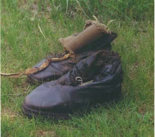 http://www.morrisoncountyhistory.org/museumpics/bsshoes.jpg Buckles & Snaps shoes - just as overbuilt as the underpants in the photo at the beginning of the article. These shoes were made for Samuel Thomas by Henry Bermel of Randall, MN. These artifacts are in the Morrison County Historical Societys collections. Photos by Mary Warner, 2002.